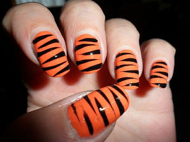 Tiger Stripes A Modern Take on Orange Nail Designs